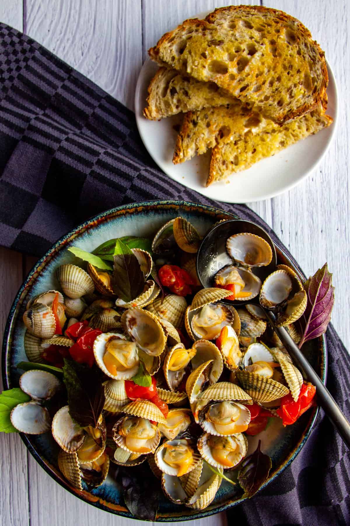 BeerBraised Cockles with Tomato and Basil Braised & Deglazed