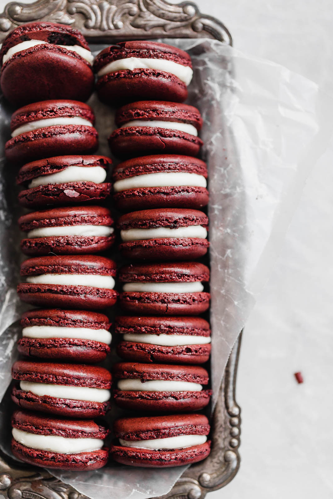 Red Velvet Macarons with cream cheese frosting Broma Bakery