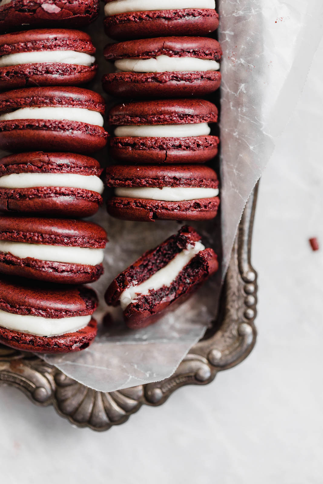 Red Velvet Macarons with cream cheese frosting Broma Bakery