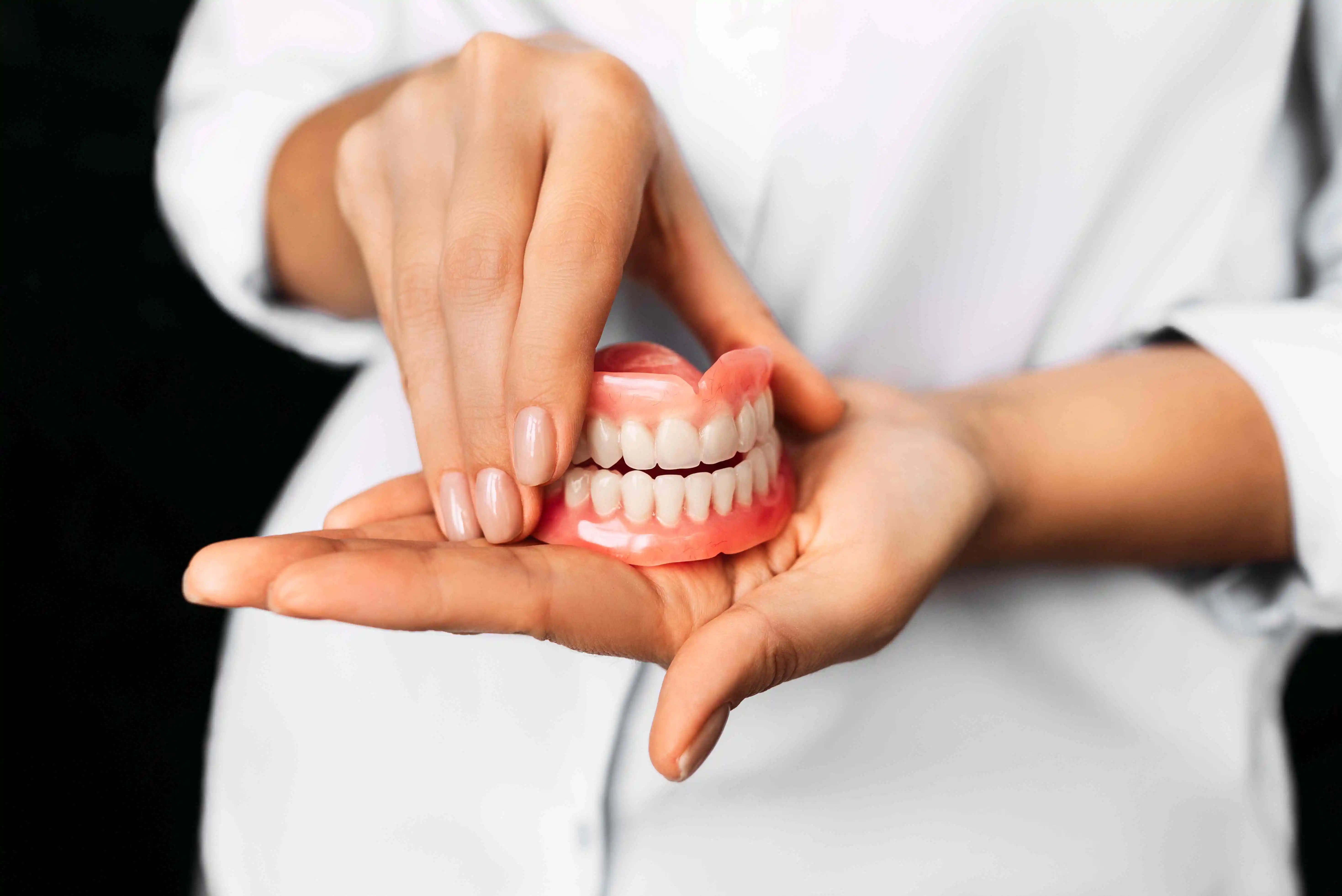 How to Clean Dentures To Prevent Wear & Tear, Implement Care
