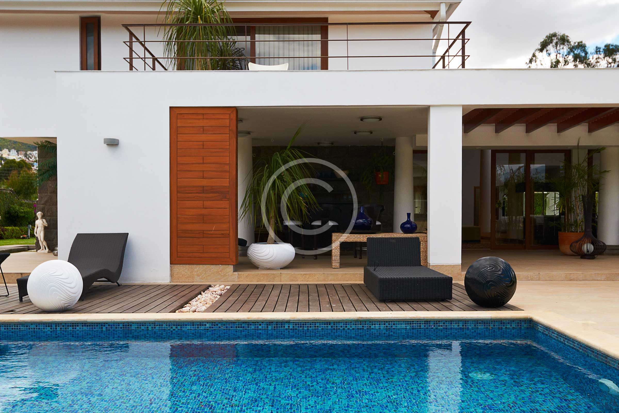 Endless pool design using bluestone with pool fence & fountain Bruner Real Estate