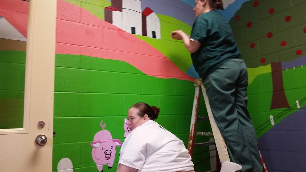 Mural BWTL painted inside of MCCF Female visitation room area for children to visit with their incarcerated loved one. Female inmates helped draw and paint this mural.