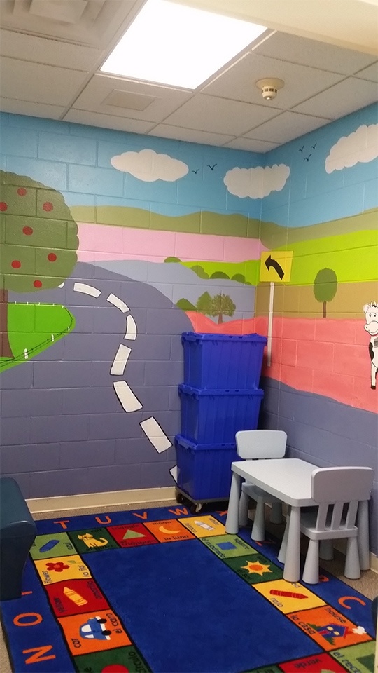 Mural BWTL painted inside of MCCF Female visitation room area for children to visit with their incarcerated loved one. Female inmates helped draw and paint this mural.