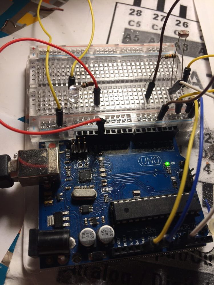 Setup and configure a photoresistor for use with Arduino Uno
