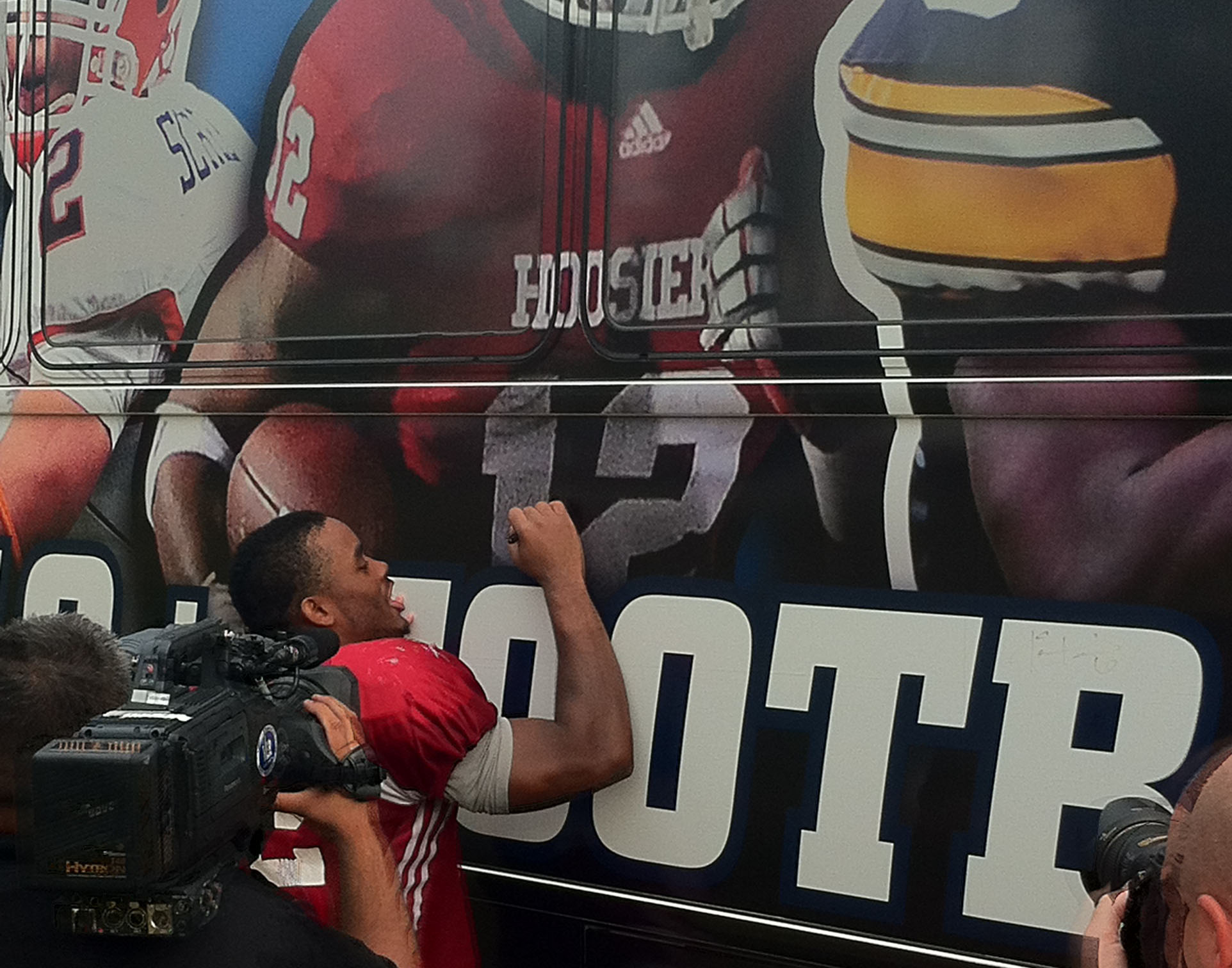 Sign Here Big Ten stars autograph BTN tour bus Big Ten Network