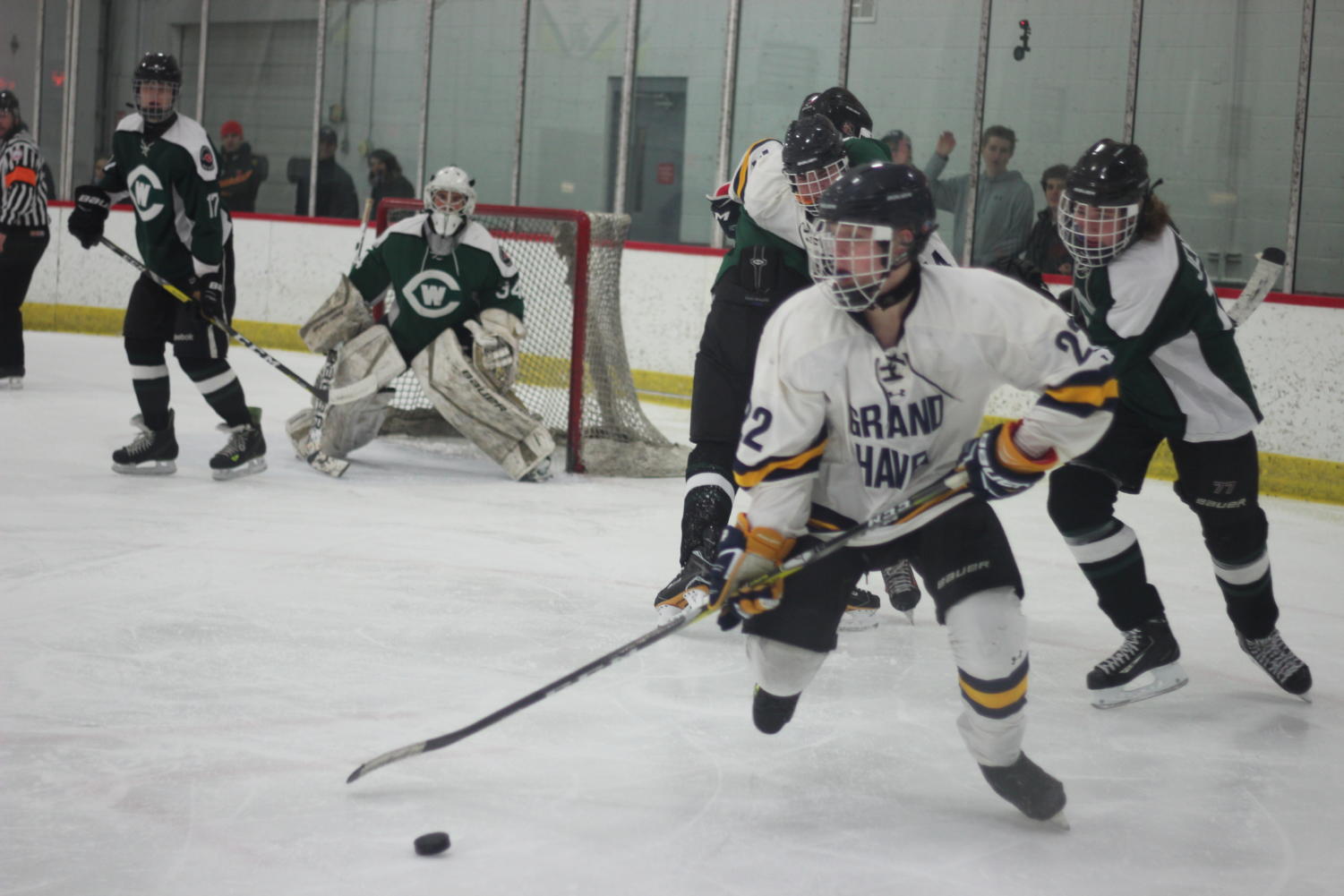 Bucs hockey lights up scoreboard en route to victory over Jenison The