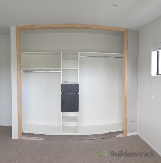 Plaster and paint to a wardrobe door enlargement ( 414043) Builderscrack