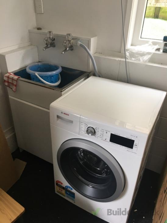 Removing old laundry tub, install and plumb a new one ( 558853