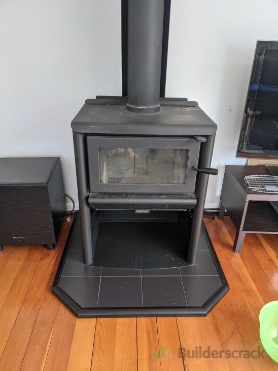 Uninstallation of stand alone fireplace and chimney + TV aerial ( 576564) Builderscrack