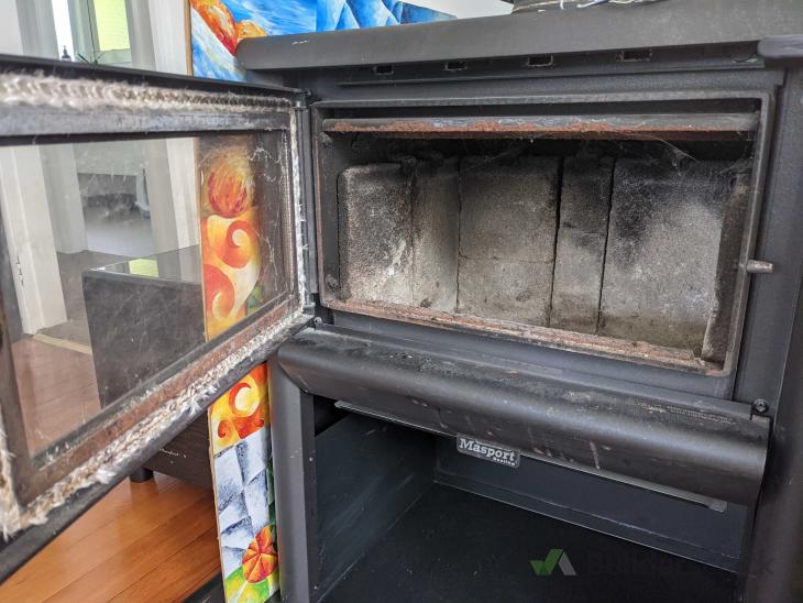 Uninstallation of stand alone fireplace and chimney + TV aerial ( 576564) Builderscrack