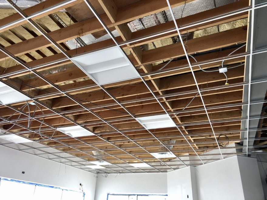 Drop ceiling grid is ready for lighting and diffusers at BP in Waukegan Commercial Development