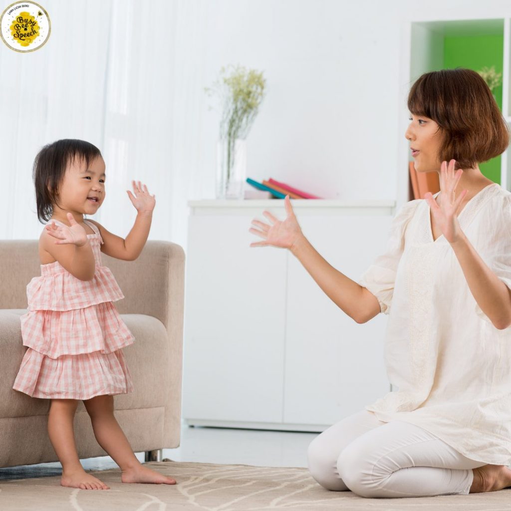 lady and child imitating actions
