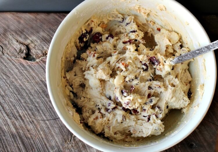 A white bowl of cookie dough