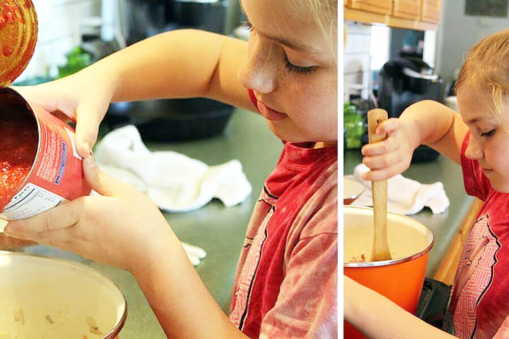 pouring a can of tomatoes into a pot