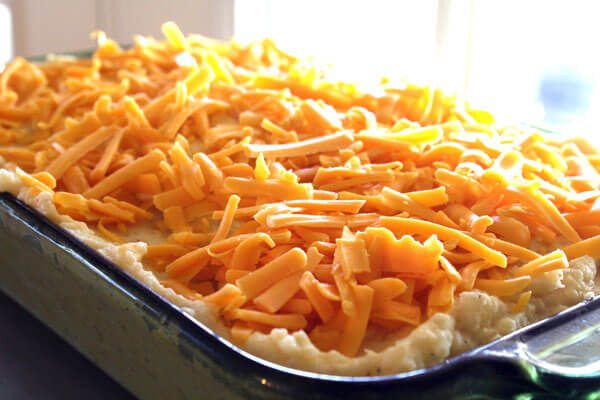 Say no to boring potatoes with Cheesy Mashed Potato Casserole. Load 'em up with cheddar cheese, sour cream and butter, and give your meal a special side.