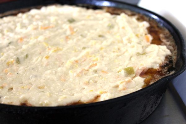 Sweet and savory Cheddar Tomato Cornbread is as delicious as it sounds! Sweet corn, green chiles, cheddar cheese and red ripe tomatoes round out this bread.