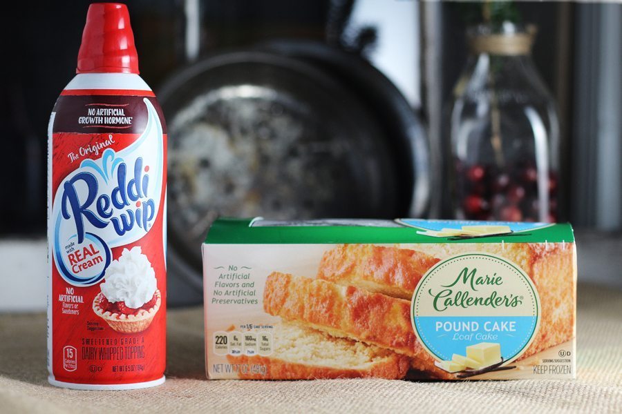 We used whipped cream and pound cake to make our bread pudding recipe. A can of whipped cream next to a pound cake