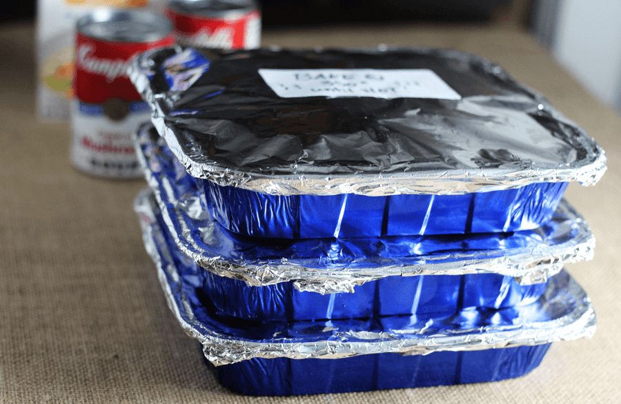 Everyone needs an Easy Vegetable Chicken Rice Casserole for dinner. Make once, eat 4 times! Tender chicken, veggies, rice + cheese topping. A stack of covered pans