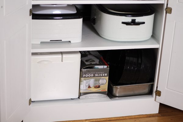 Storing appliances by frequency of use helped me keep my kitchen pantry organized.