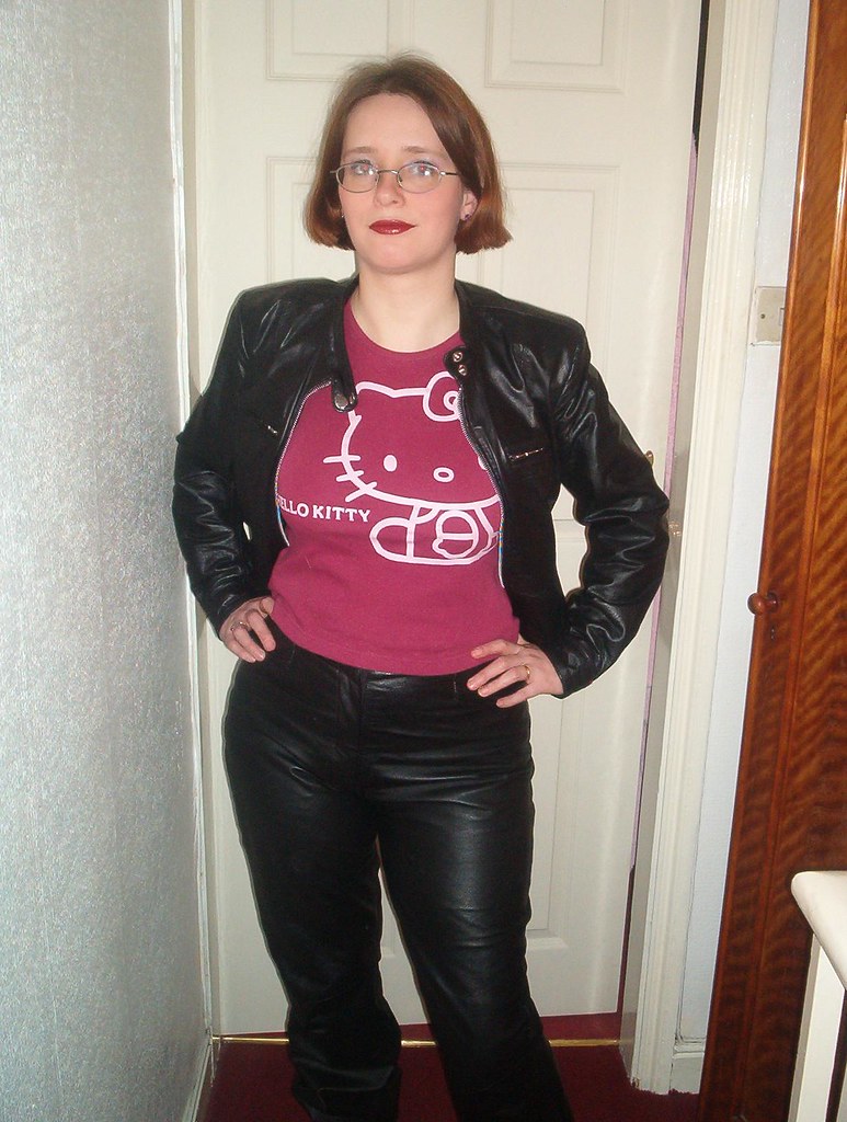 Hello Kitty shirt Linda in leather jacket, jeans and HK sh… Flickr