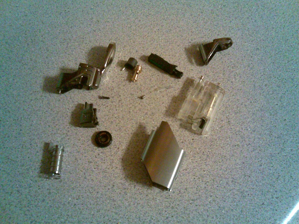 Exploded View The guts of a Colibri lighter. The valve on ??? Flickr