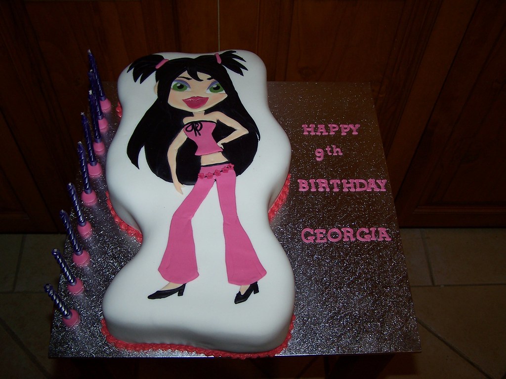 Bratz birthday cake Chocolate mudcake covered in fondant i… Flickr