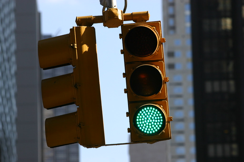 traffic light This traffic light was merrilly swinging at … Flickr