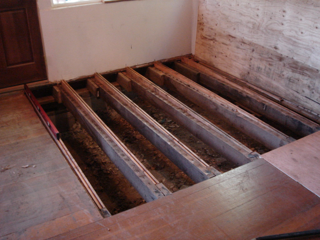 Living room floor 3 Sistering joists to get to level. c b Flickr