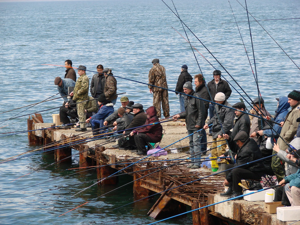 Fishing in Vladivostok Old guys fishing on a pier in Vladi… Flickr