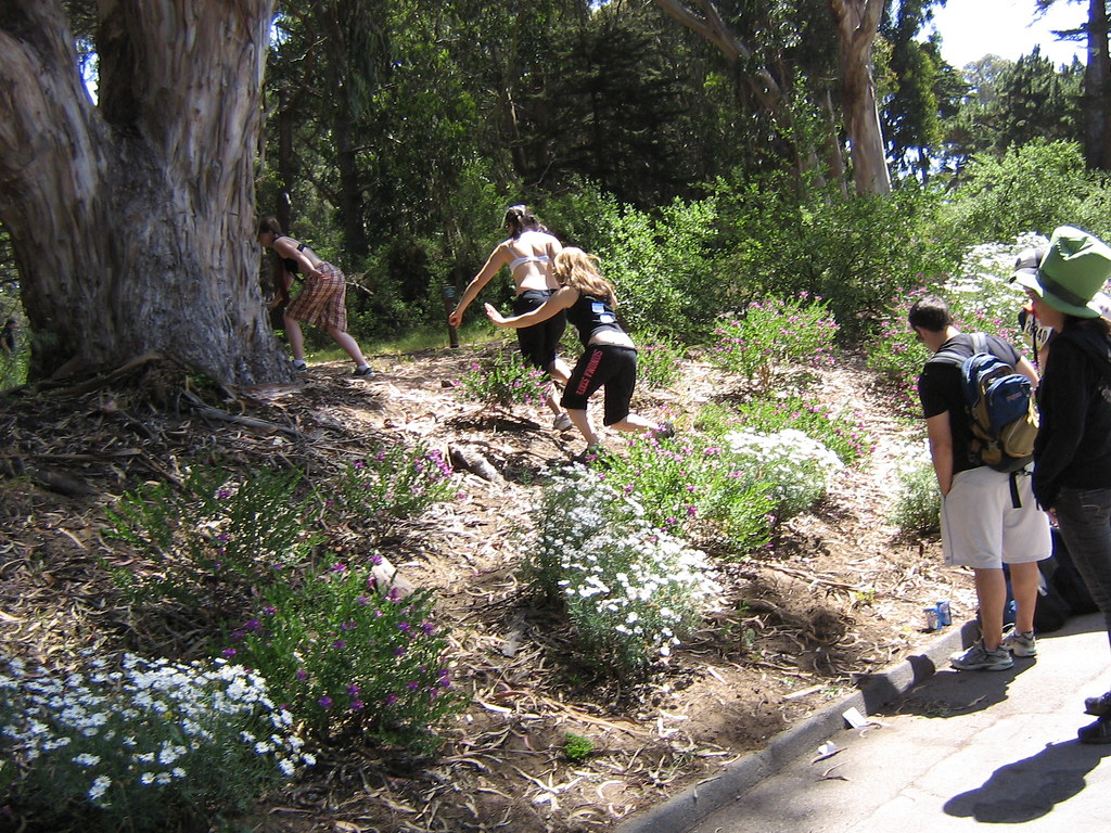 Girls Peeing They were running behind the tree to go pee