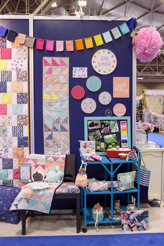 In Color Order Curiosities Quilt Market Booth