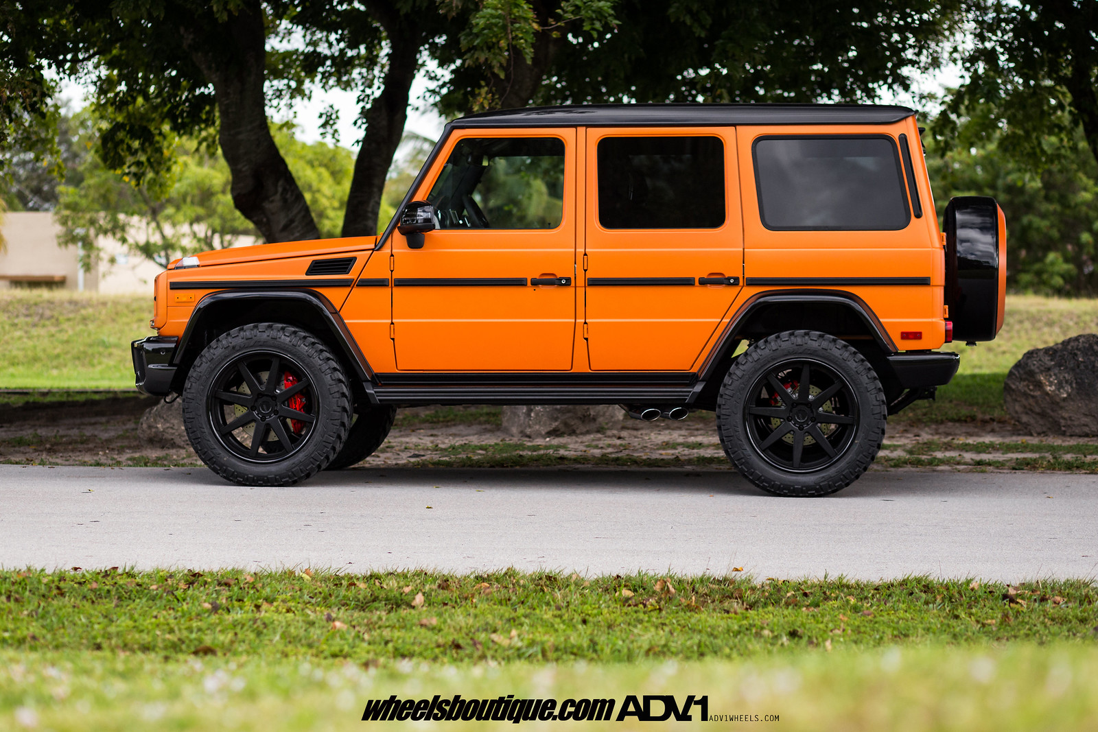 Orange Is The New Black? Dual Lifted GWagons by Wheels Boutique