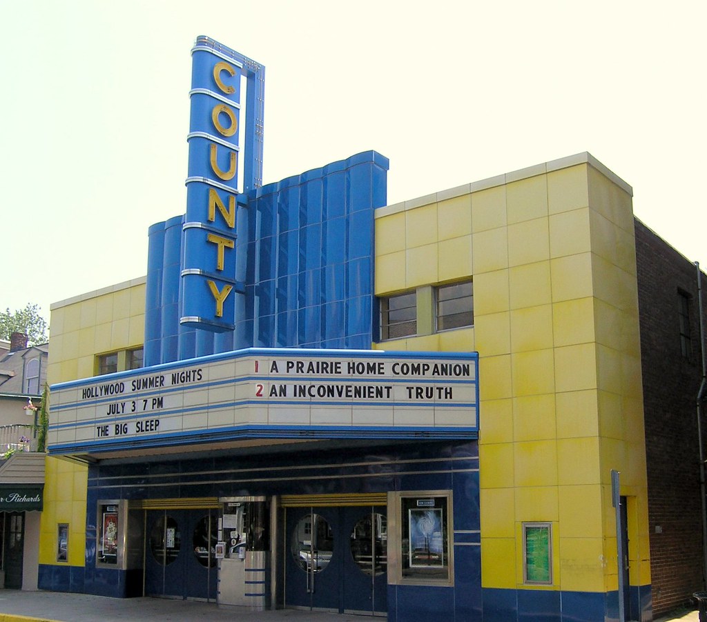 An oldfashioned movie theater that is still showing movie… Flickr