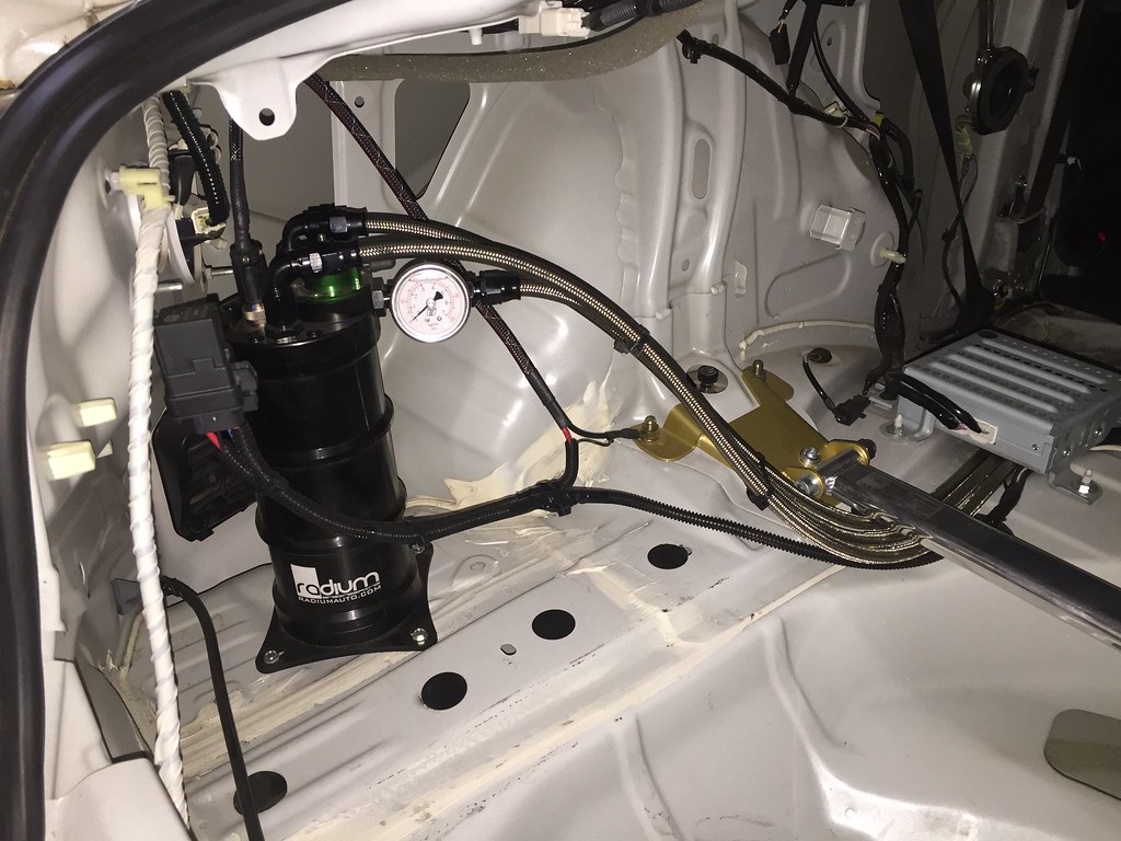 Fuel Surge Tank Installation by Equilibrium Tuning Radium