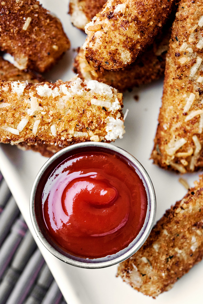 spicy parmesan breaded mozzarella sticks w/ sriracha ketchup in the