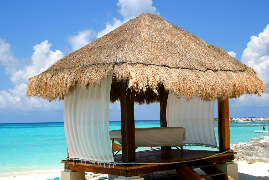 Massage Hut Massage hut on the beach in Cancun. braewick Flickr