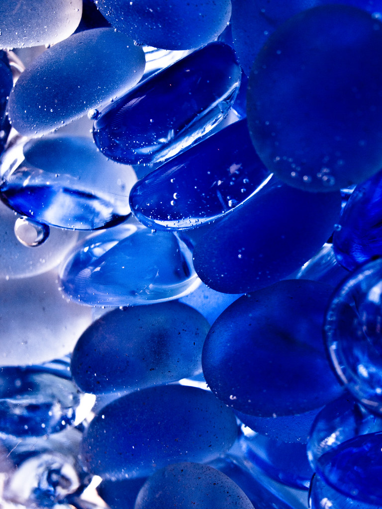 Blue Beads Blue glass beads in curved glass vase PERMISSIO… Flickr