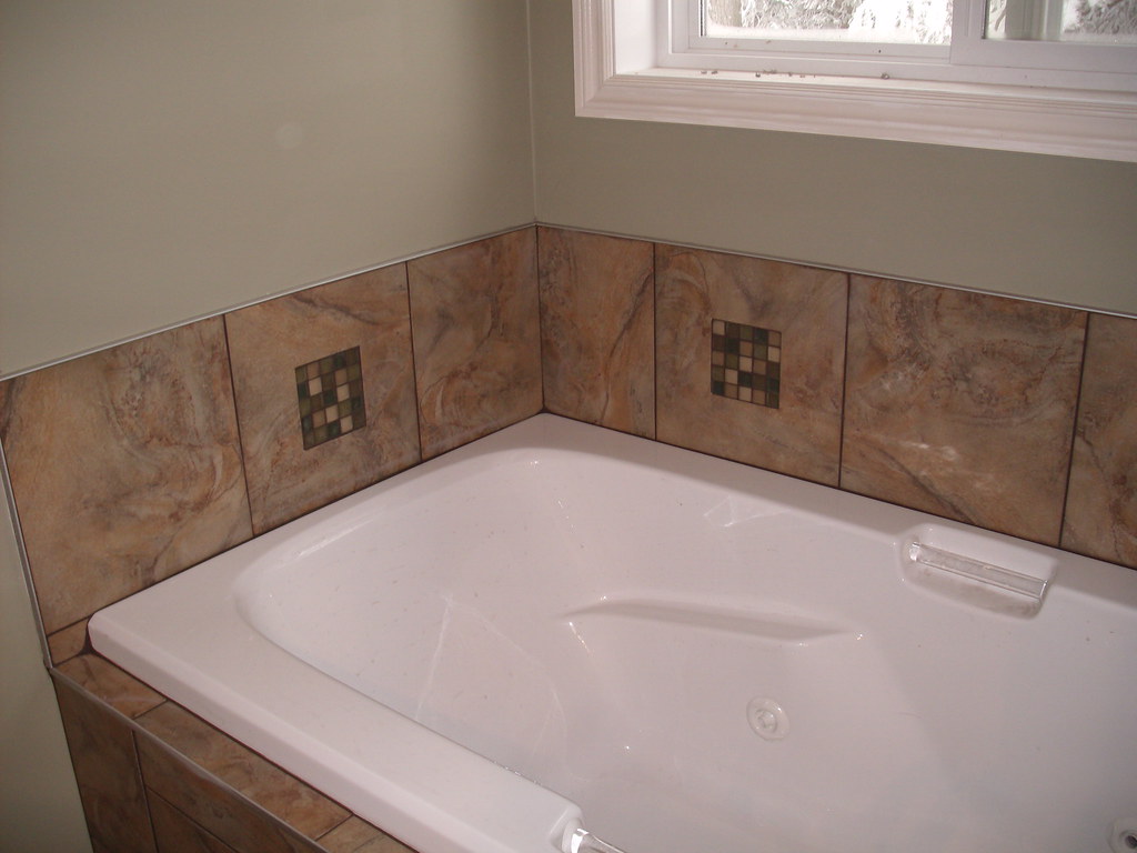 Tub backsplash, with custom cut glass inserts Ge digital c… Tiles