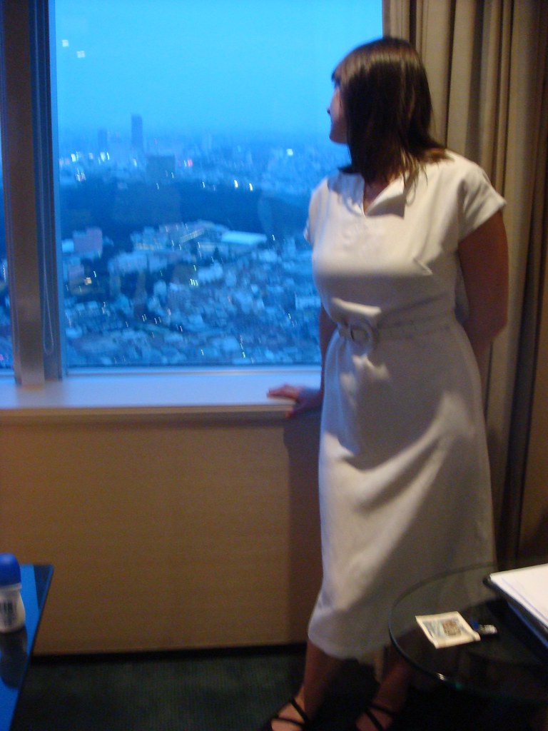 wife poses by window | Oliver East | Flickr