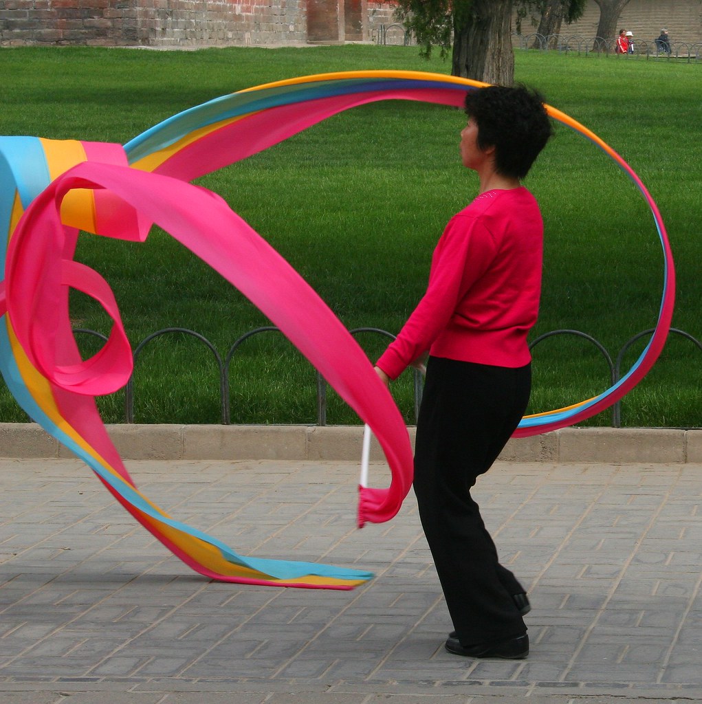 Streamers A Chinese lady relaxes with her streamers in a p… Flickr
