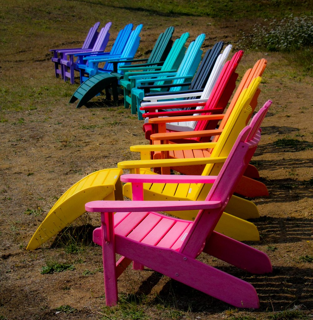 Rainbow A sweep of colorful Adirondack chairs for sale in … Flickr