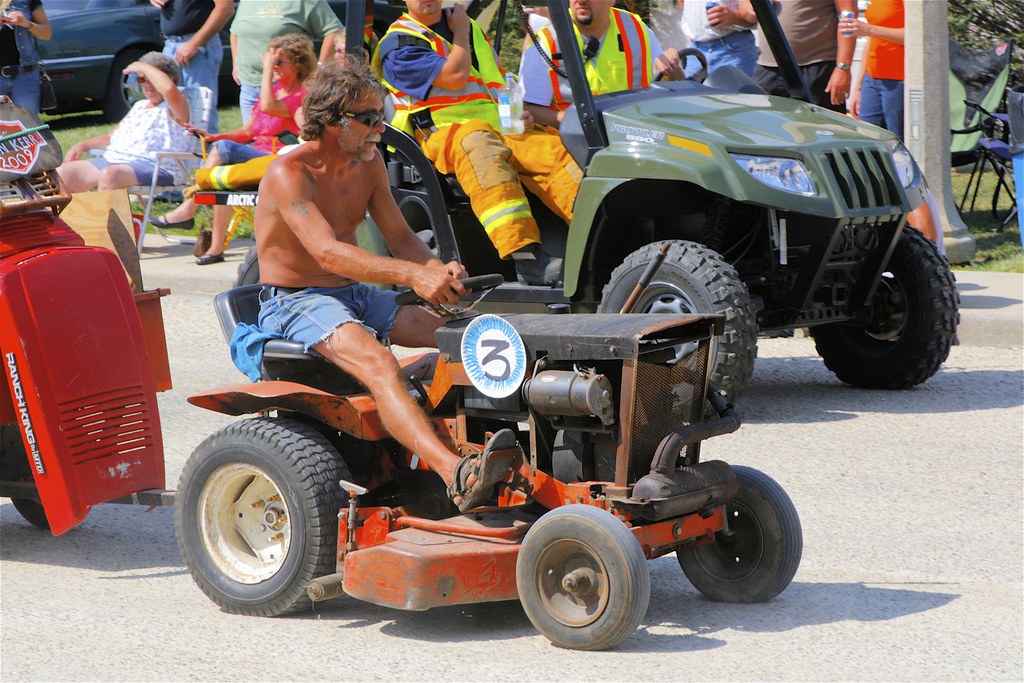 Shirtless Guy on Junk Lawn Mower "The World's Greatest Jun… Flickr