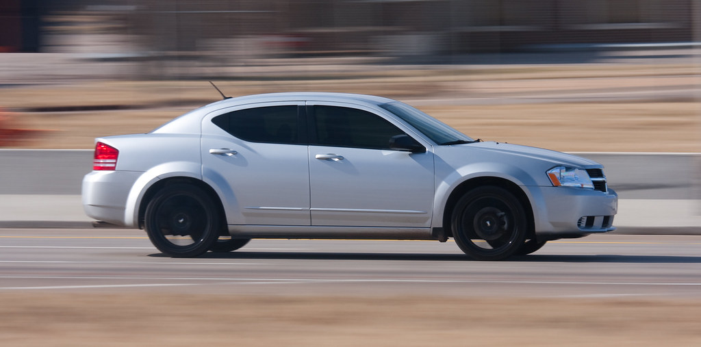 Dodge Avenger with large black rims Large version on black… Flickr