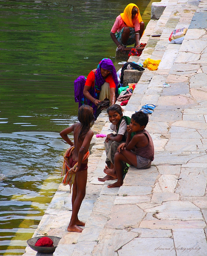 Village women bathing and washing clothes, UdaipurIndia Flickr
