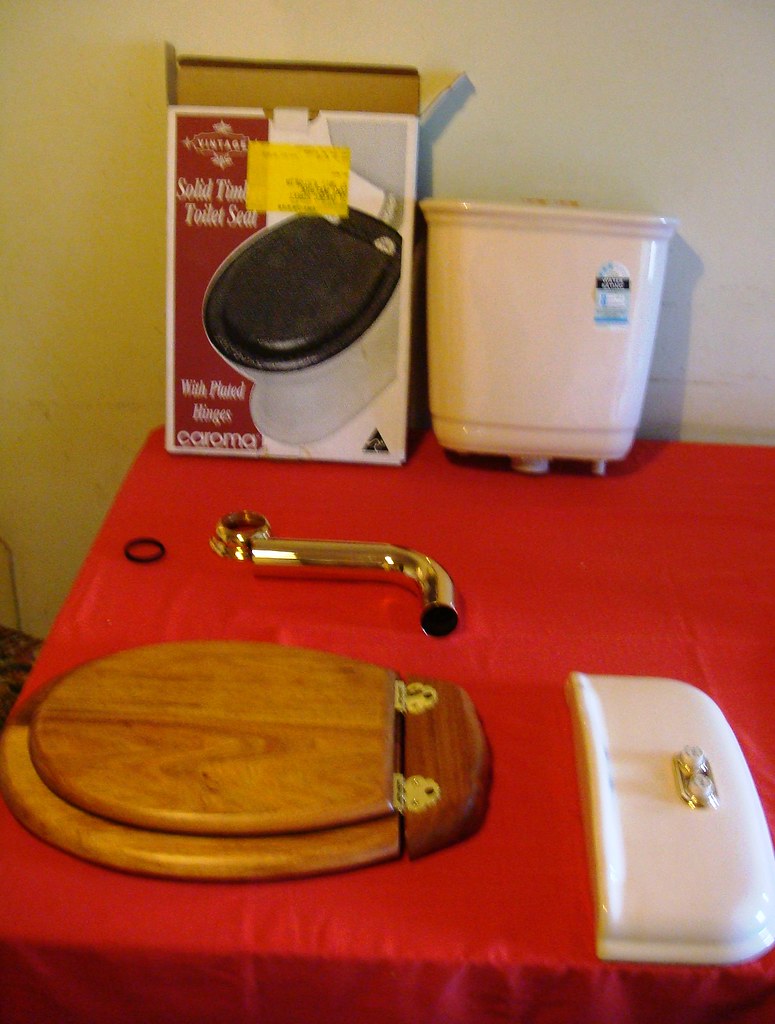 Putting the toilet together Here is the toilet just out of… Flickr