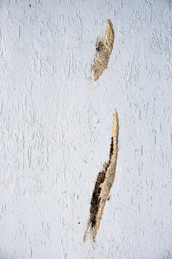 Two long brown stains on white wall Two long brown dirt st… Flickr