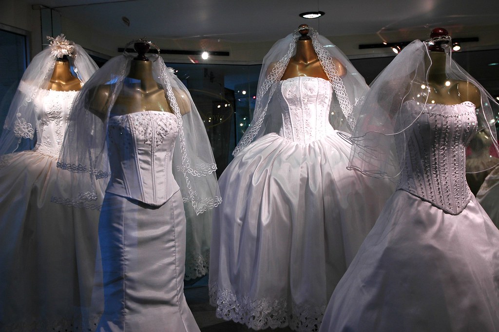 White wedding dresses and veils, on display, original desi… Flickr