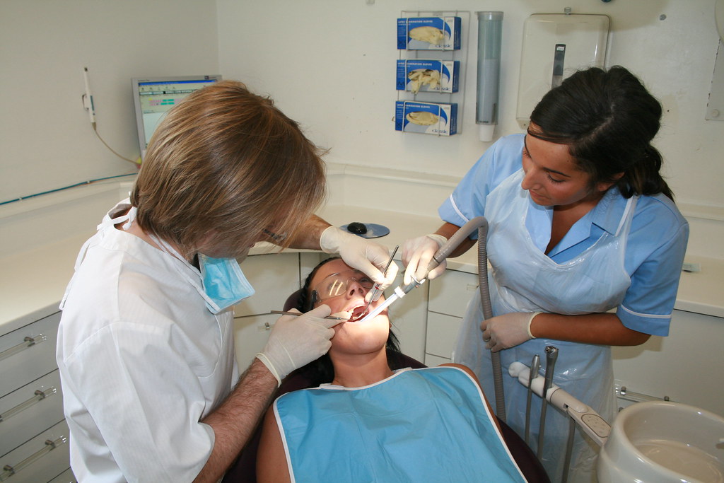 Dental care with dentist and dental nurse NHS Salford Flickr