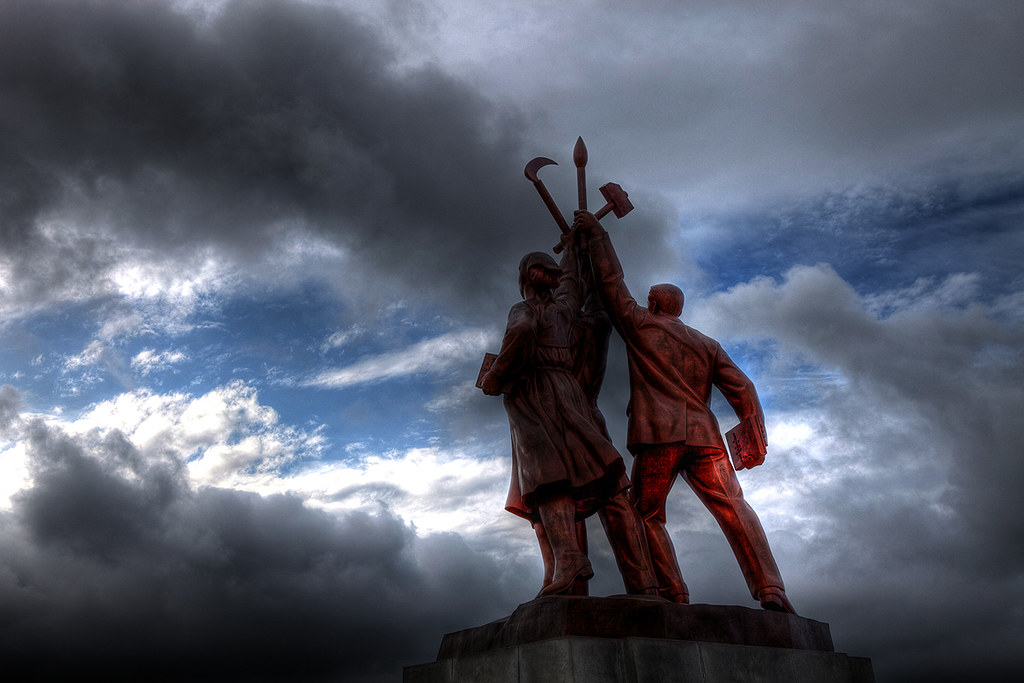 North Korea Hammer, Sickle, Brush Statues near Juche Tow… Flickr