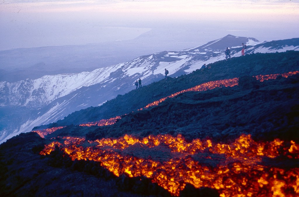 The lava, the snow, and the people A group of spectators … Flickr